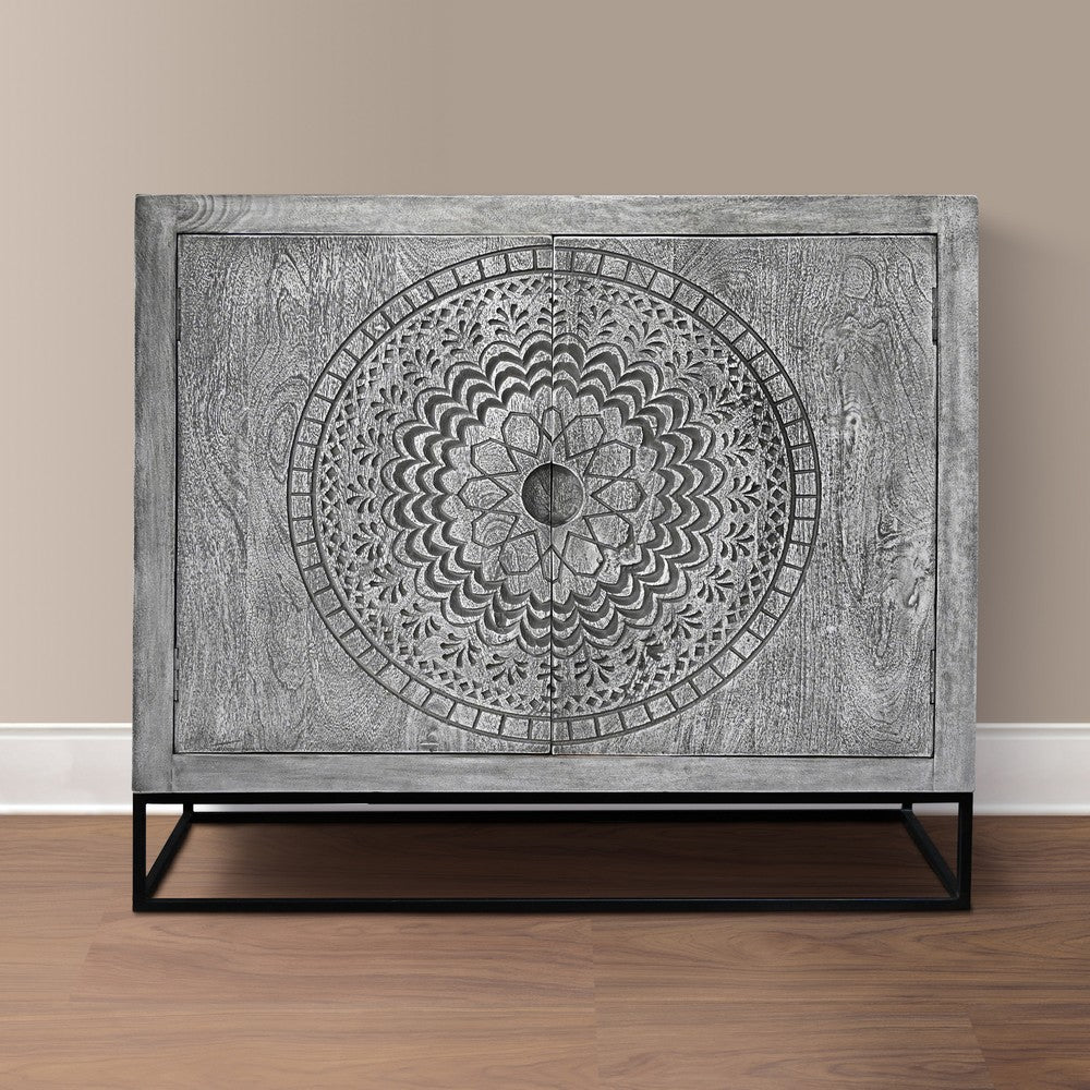 Zera 39 Inch Accent Cabinet with 2 Doors, Hand Carved Medallion, Sandblasted Gray Mango Wood, Black Iron Frame By The Urban Port