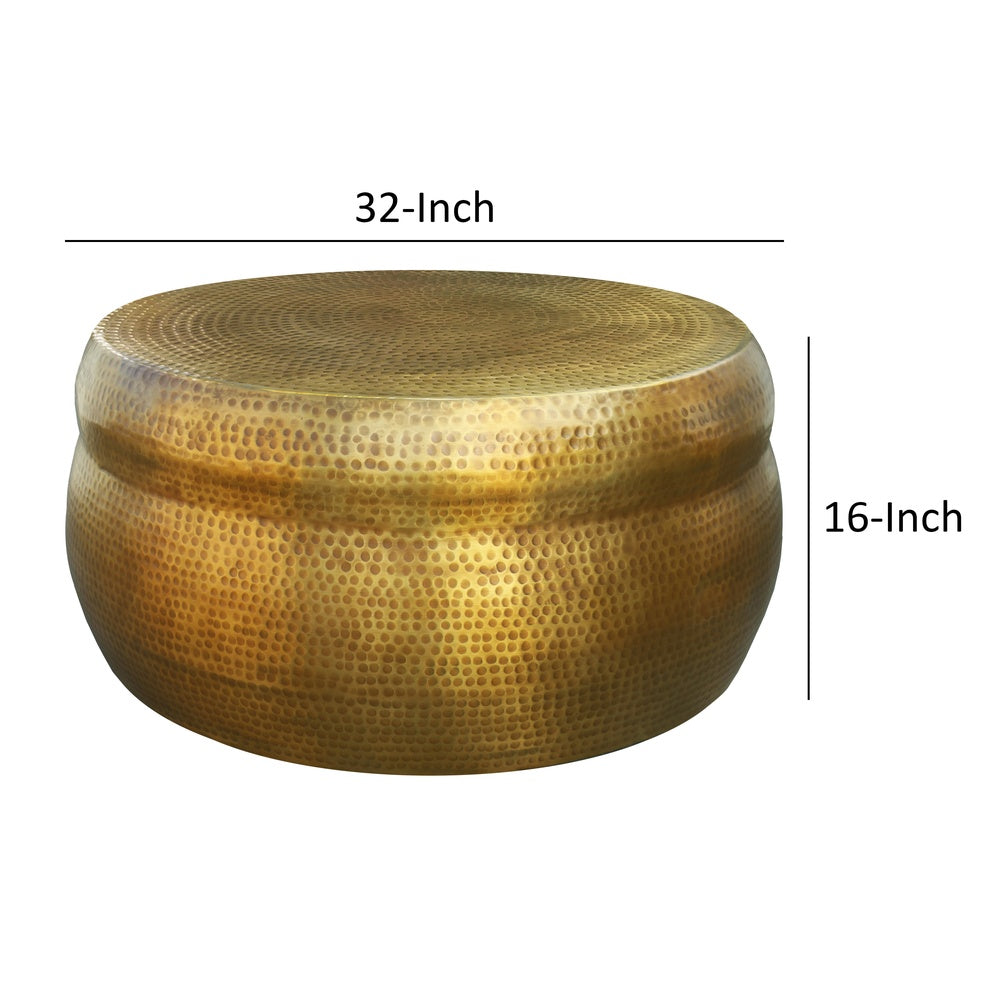 32 Inch Artisanal Round Drum Coffee Table, Hammered Embossed Texturing, Aluminum, Antique Brass By The Urban Port