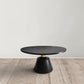 Fawn 32 Inch Coffee Table, Black Mango Wood Round Top, Modern Tapered Pedestal Base, Shiny Brass Support The Urban Port