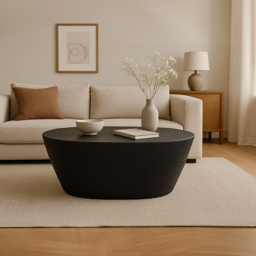 Josi 36 Inch Oval Drum Coffee Table, Hammered Design, Matte Black Metal By The Urban Port