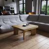 Cascade 32 Inch Coffee Table, Handcrafted Natural Acacia Wood, Square Top with Diagonal Wide Panel Legs By The Urban Port