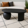 Uri 38 Inch Oval Coffee Table, Mango Wood Full and Half Spherical Leg, Sandblasted Black The Urban Port