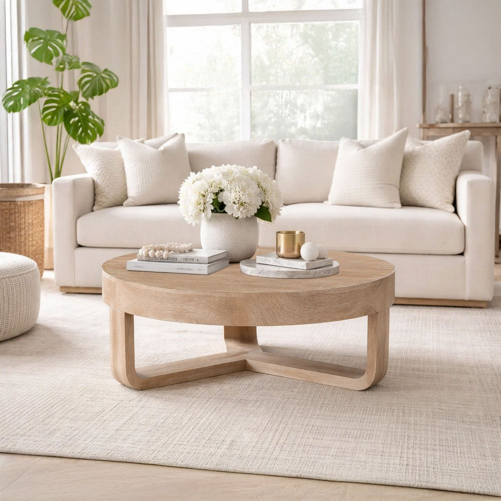 Milan Coffee Table, 32 Inch Round Top, Mango Wood with Sandblasted Natural Brown, Open Sled Base By The Urban Port