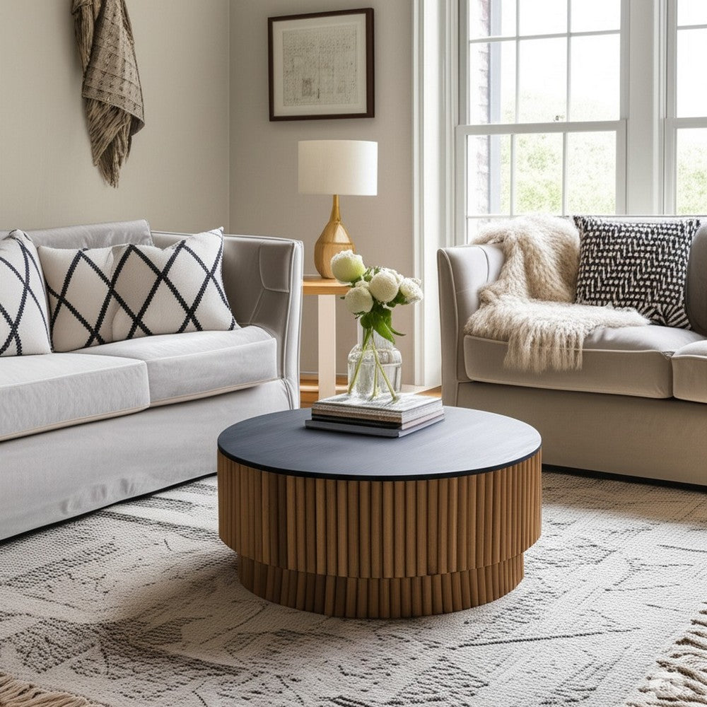 Montoya Coffee Table | 34" Round Black Top | Brown Mango Wood Fluted Plinth Base By The Urban Port