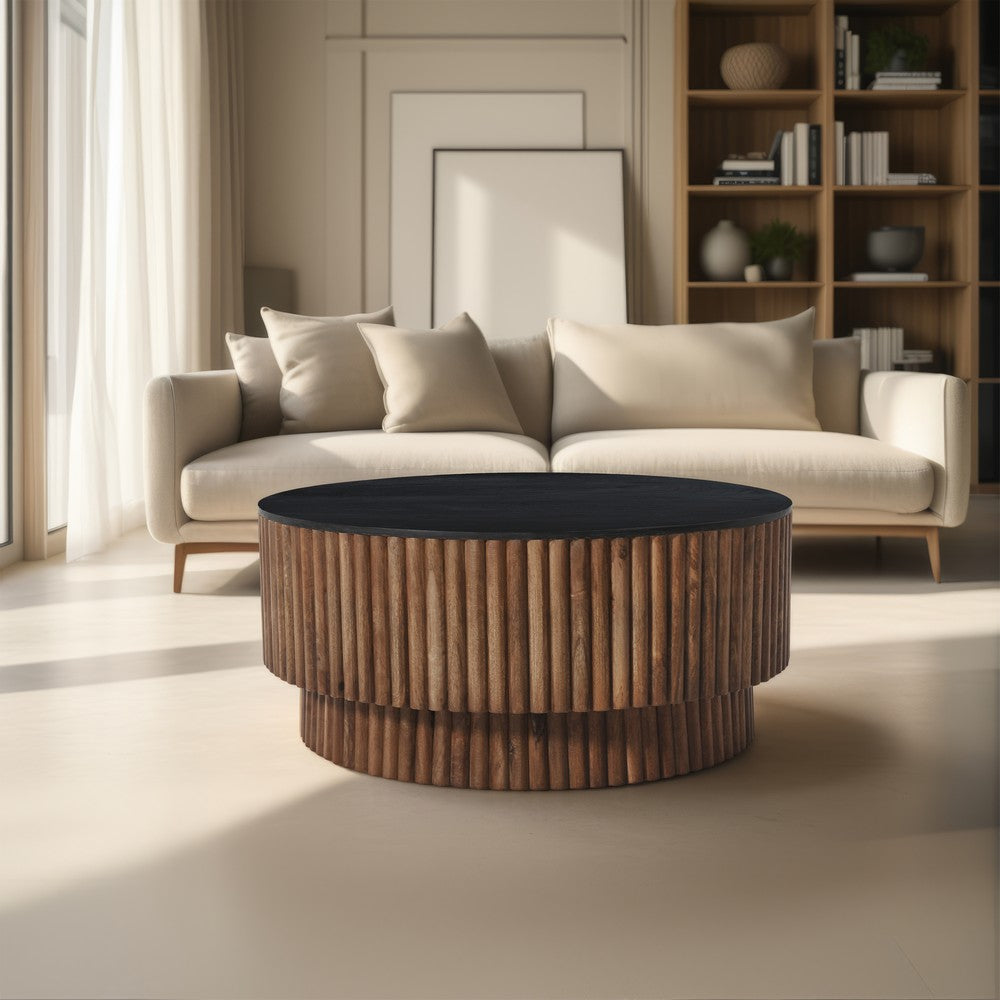 Montoya Coffee Table | 34" Round Black Top | Brown Mango Wood Fluted Plinth Base By The Urban Port