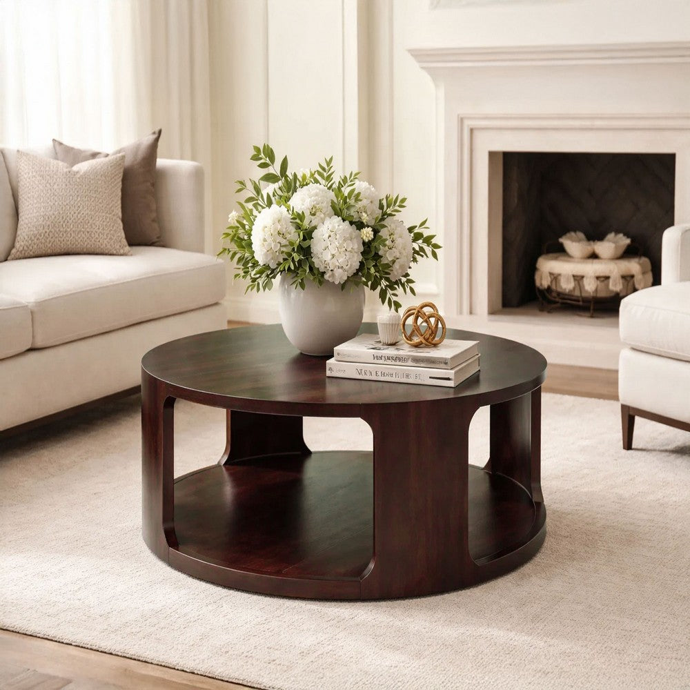 Bard Coffee Table, 38 Inch Round Top with Shelf, Walnut Brown Mango Wood Sculptural Frame By The Urban Port