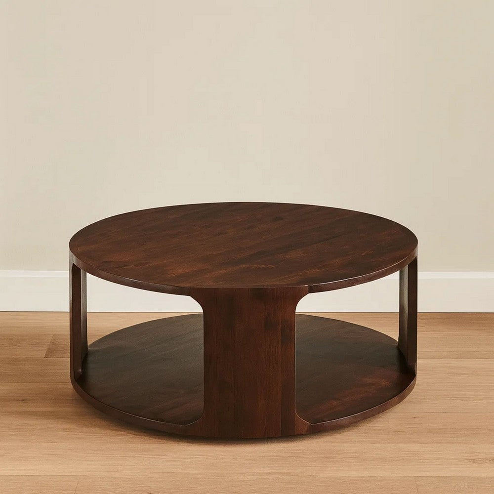 Bard Coffee Table, 38 Inch Round Top with Shelf, Walnut Brown Mango Wood Sculptural Frame By The Urban Port