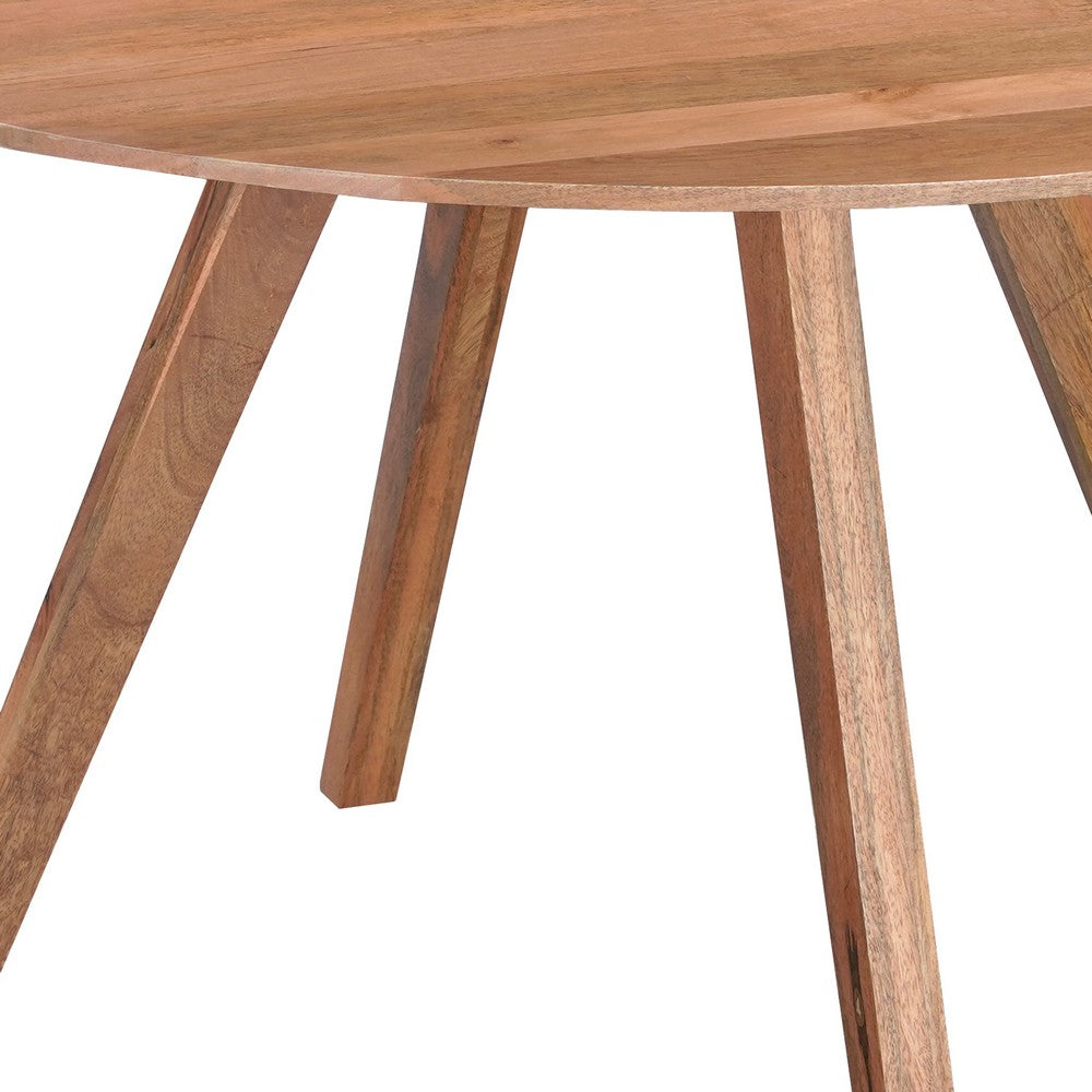 Temi Dining Table | 47" Round Top | Handmade Natural Brown Mango Wood | Angled Four Legged Base By The Urban Port