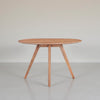 Temi Dining Table | 47" Round Top | Handmade Natural Brown Mango Wood | Angled Four Legged Base By The Urban Port