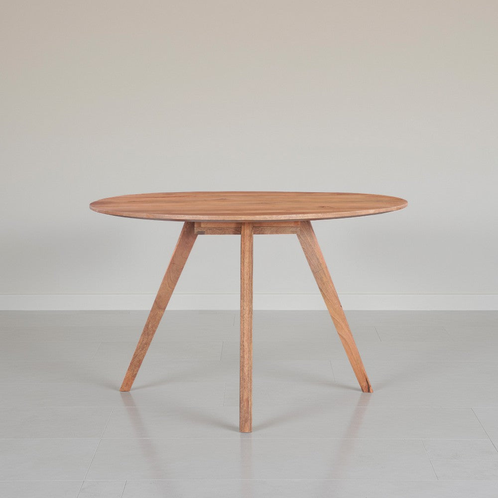 Temi Dining Table | 47" Round Top | Handmade Natural Brown Mango Wood | Angled Four Legged Base By The Urban Port
