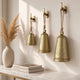 Loma Set of 3 Wall Hanging Bells | Antique Gold Finish | Natural Jute Rope | Boho Home Decor By The Urban Port