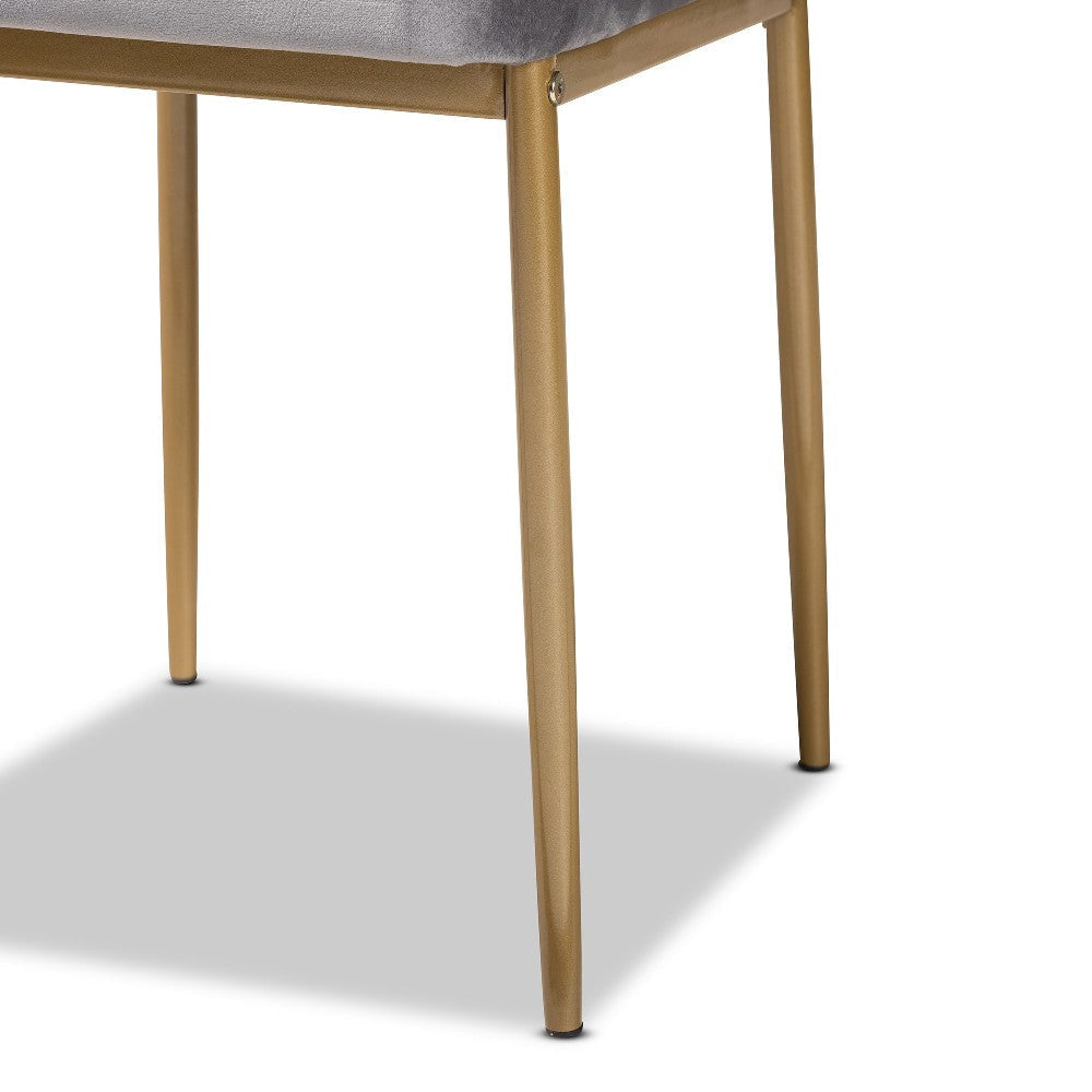 Baxton Studio Armand Modern Glam and Luxe Grey Velvet Fabric Upholstered and Gold Finished Metal 4-Piece Dining Chair Set