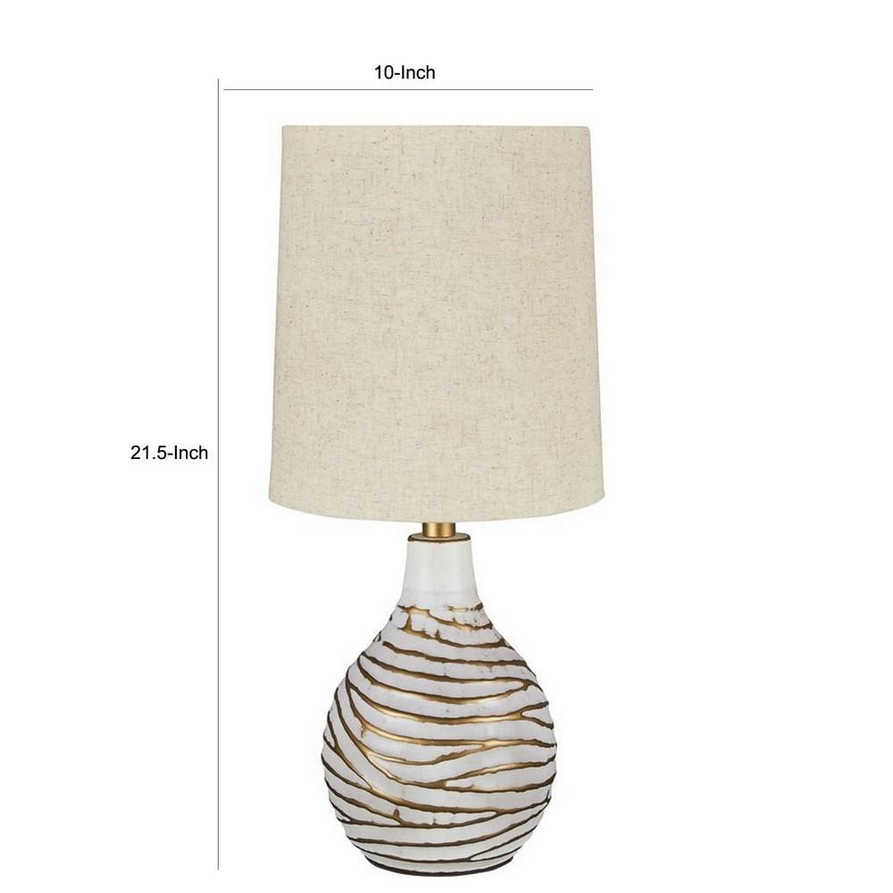 Pot Bellied Metal Table Lamp with Textured Golden Embellishment White By Casagear Home BM227194
