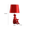 Fabric Shade Table Lamp with Polyresin Sitting Clown Base Red By Casagear Home BM231809