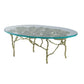 47 Inch Artisanal Coffee Table with Metal Frame, Oval Clear Glass Top, Gold By Casagear Home