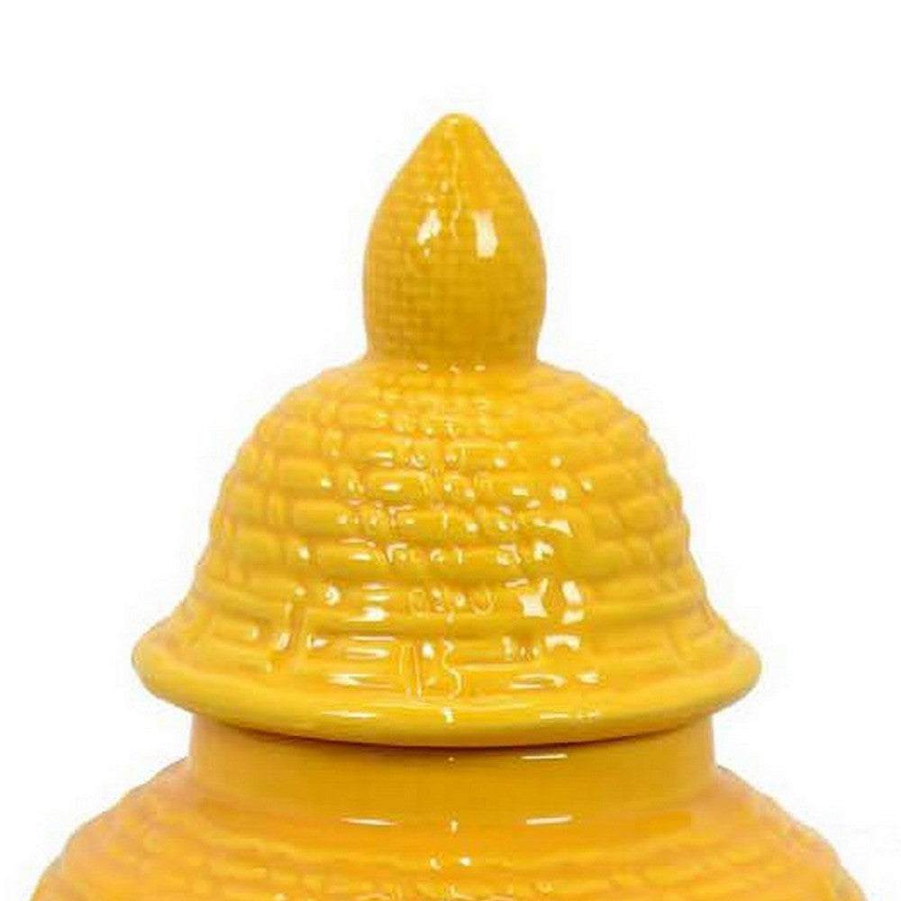 Bryan 13 Inch Ceramic Temple Jar, Geometric Print, Finial Top, Yellow By Casagear Home
