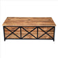 54 Inch Metal Cross Front Mango Wood Trunk Storage Coffee Table with Hinged Top,Brown and Blac By The Urban Port