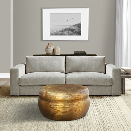 32 Inch Artisanal Round Drum Coffee Table, Hammered Embossed Texturing, Aluminum, Antique Brass By The Urban Port